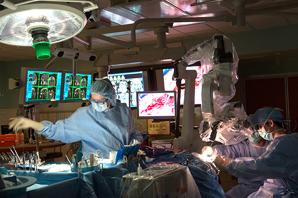 Doctors perform neurosurgery