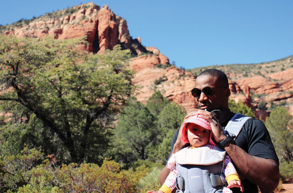Brenton Pennicooke, MD, hiking in Sedona, AZ, with his baby Amelia.