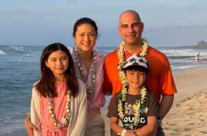 Amy Lee, MD, pictured with her family, is Division Chief of Neurological Surgery at Seattle Children’s Hospital and a Washington University alum.